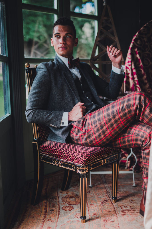 Made-to-Measure trews styled with tweed jacket and waistcoat and handmade tartan bowtie.