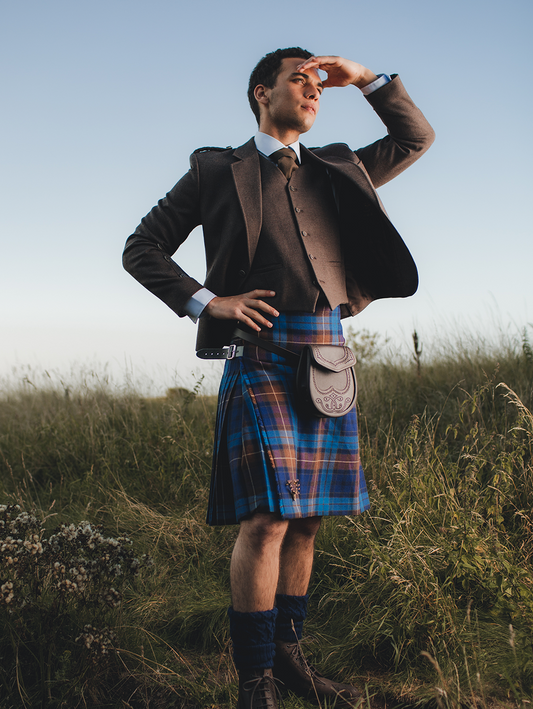 A model wearing the Blue Buchanan Tartan kilt 