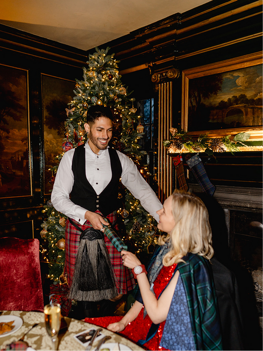 Man wearing Red Nicolson Muted kilt