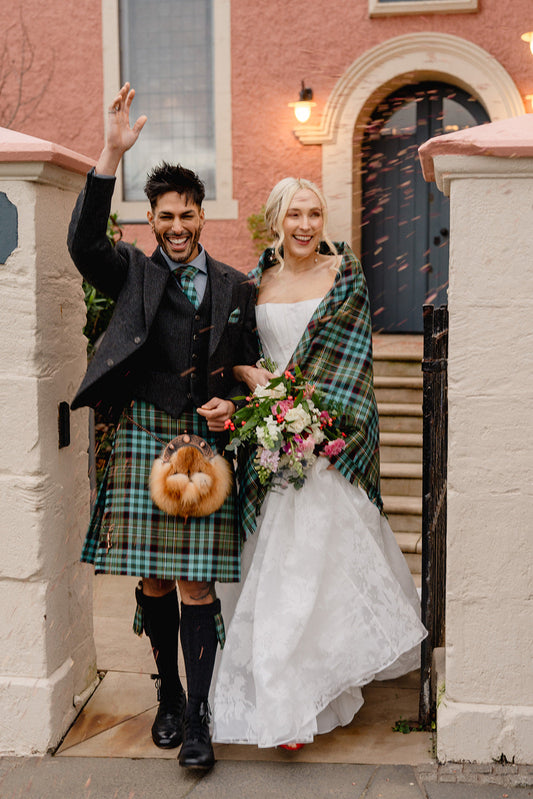 Bride and Groom wearing hghlandwear