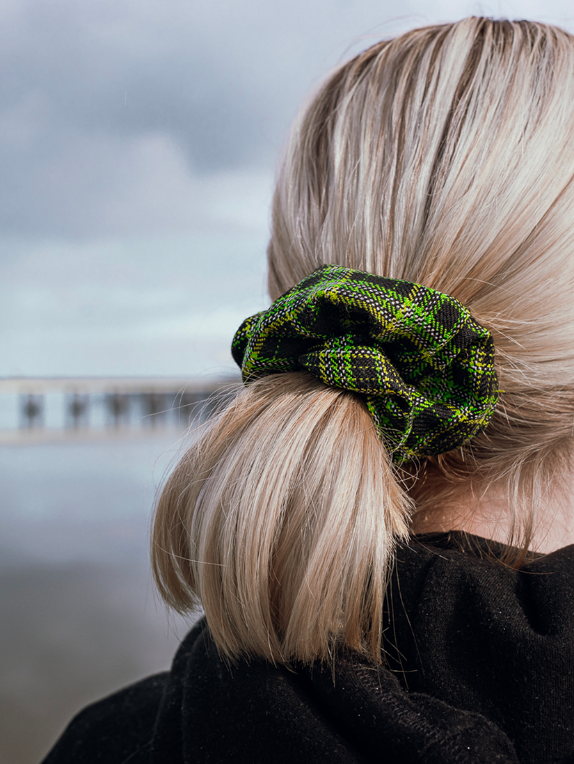 Person wearing the Xbox tartan scrunchie